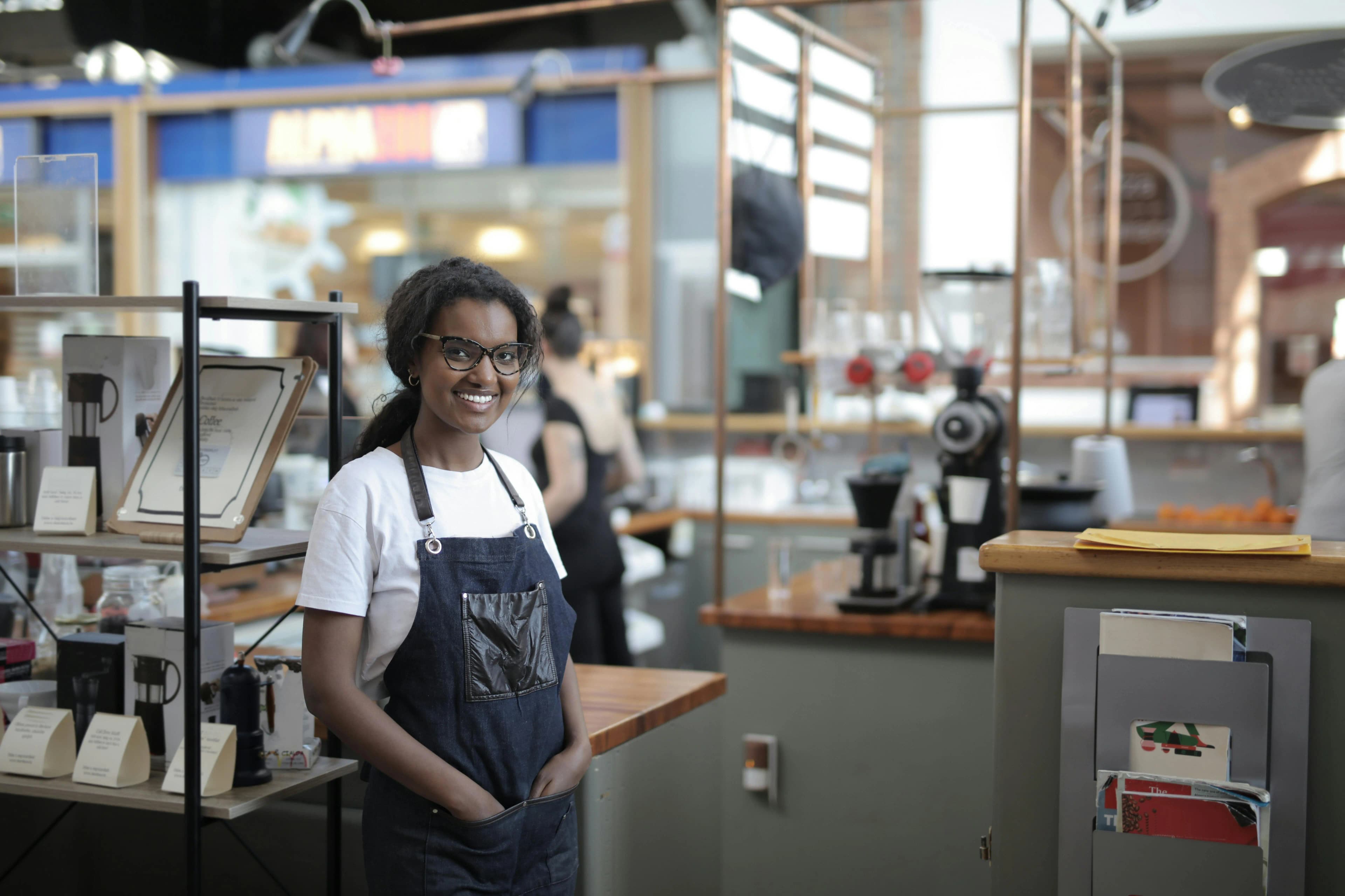 Small business owner at her storefront